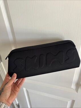 SKIMS Neoprene Embosssed Makeup Bag